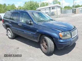 2004 Jeep Grand Cherokee Laredo with VIN 1J4GW48N94C407642, listed as a IAAI auction lot 42381436 with 177,141 mi miles and . Bid and sale history available at DreamBid. Image 1.