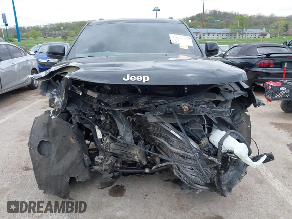 2017 Jeep Grand Cherokee Laredo with VIN 1C4RJFAG2HC649408, listed as a IAAI auction lot 42072440 with 58,818 mi miles and . Bid and sale history available at DreamBid. Image 12.