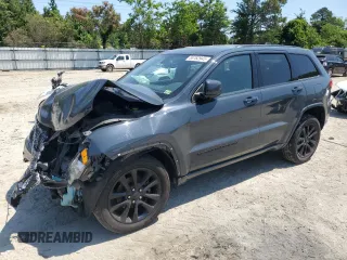 2018 Jeep Grand Cherokee Altitude with VIN 1C4RJFAGXJC267021, listed as a Copart auction lot 58762945 with 93,347 mi miles and Salvage title. Bid and sale history available at DreamBid. Image 1.