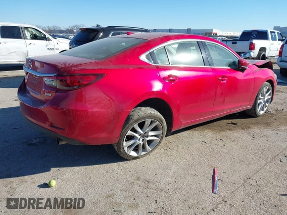 2017 Mazda 6 Touring with VIN JM1GL1V51H1126762, listed as a IAAI auction lot 41394606 with 62,072 mi miles and . Bid and sale history available at DreamBid. Image 4.