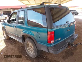 1994 Ford Explorer z VIN 1FMCU22X2RUC98656, wystawiony jako IAAI lot #41775781 z przebiegiem 140 598 mil mil oraz . Historia ofert i sprzedaży dostępna na DreamBid. Obrazek 3.