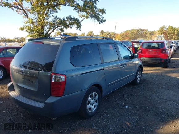 2009 Kia Sedona LX with VIN KNDMB233996320165, listed as a IAAI auction lot 40575451 with 122,057 mi miles. Bid and sale history available at carsss.com. Image 4.