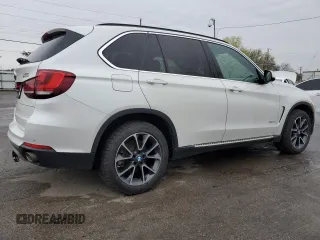 2014 BMW X5 xDrive35d with VIN 5UXKS4C51E0C07135, listed as a Copart auction lot 51867345 with 105,895 mi miles and Clean Title. Bid and sale history available at carsss.com. Image 3.