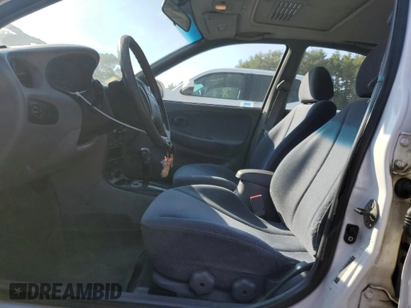 2000 Hyundai Elantra GLS with VIN KMHJF35F8YU922503, listed as a Copart auction lot 71063234 with 209,706 mi miles and Clean title. Bid and sale history available at DreamBid. Image 7.