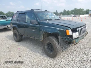 1997 Jeep Grand Cherokee Laredo with VIN 1J4GZ58SXVC595012, listed as a Copart auction lot 59746655 with Not provided miles and Salvage title. Bid and sale history available at DreamBid. Image 4.
