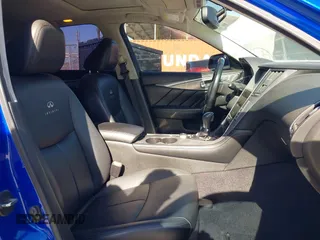 2014 Infiniti Q50 with VIN JN1BV7AP6EM689012, listed as a IAAI auction lot 42063216 with 114,785 mi miles and . Bid and sale history available at DreamBid. Image 5.