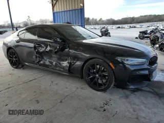 2021 BMW 8 Series 840i with VIN WBAGV2C08MCG13060, listed as a Copart auction lot 42387435 with 39,761 mi miles and Salvage Title. Bid and sale history available at DreamBid. Image 4.