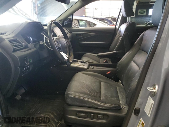 2023 Honda Ridgeline RTL-E with VIN 5FPYK3F77PB001460, listed as a Copart auction lot 61383785 with 27,423 mi miles and Salvage title. Bid and sale history available at DreamBid. Image 7.