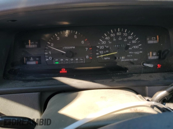 1995 Toyota T100 z VIN JT4VD22FXS0007824, wystawiony jako Copart lot #79159804 z przebiegiem 89 139 mil mil oraz Szkoda całkowita • Salvage title. Historia ofert i sprzedaży dostępna na DreamBid. Obrazek 9.