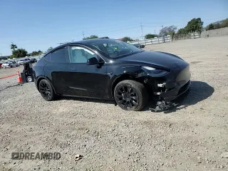 2023 Tesla Model Y Long Range with VIN 7SAYGAEE0PF642810, listed as a Copart auction lot 52181655 with 74,922 mi miles and Salvage Title. Bid and sale history available at DreamBid. Image 10.