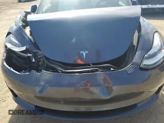2022 Tesla Model 3 with VIN 5YJ3E1EA4NF244376, listed as a Copart auction lot 52142855 with Not Provided miles and Salvage Title. Bid and sale history available at DreamBid. Image 11.