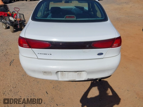 1999 Ford Escort LX with VIN 1FAFP10P1XW236632, listed as a IAAI auction lot 42325892 with 202,939 mi miles and . Bid and sale history available at DreamBid. Image 16.