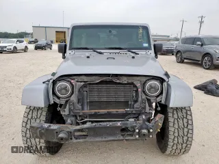 2014 Jeep Wrangler Unlimited Rubicon с VIN 1C4HJWFG3EL322449, выставлен на аукционе Copart как лот 57187665 с пробегом 122 469 миль миль и Списание • Salvage title. История ставок и продаж доступна на DreamBid. Изображение 5.