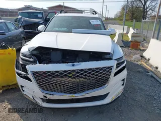 2024 Genesis GV80 z VIN KMUHCESC6RU160904, wystawiony jako IAAI lot #40675389 z przebiegiem 6 984 mil mil oraz . Historia ofert i sprzedaży dostępna na DreamBid. Obrazek 13.