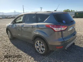 2014 Ford Escape Titanium with VIN 1FMCU9J90EUD94405, listed as a Copart auction lot 68489754 with 52,045 mi miles and Salvage Title. Bid and sale history available at DreamBid. Image 2.