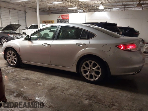 2010 Mazda 6 S Grand Touring with VIN 1YVHZ8CB4A5M08651, listed as a IAAI auction lot 41325049 with 144,834 mi miles and . Bid and sale history available at DreamBid. Image 14.