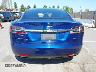 2016 Tesla Model S 90D with VIN 5YJSA1E25GF157220, listed as a IAAI auction lot 42003019 with 130,540 mi miles and . Bid and sale history available at DreamBid. Image 16.