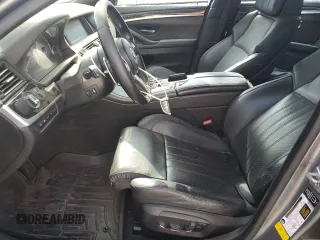 2014 BMW M5 z VIN WBSFV9C58ED593431, wystawiony jako Copart lot #54870555 z przebiegiem 172 191 mil mil oraz Szkoda całkowita • Salvage title. Historia ofert i sprzedaży dostępna na DreamBid. Obrazek 7.
