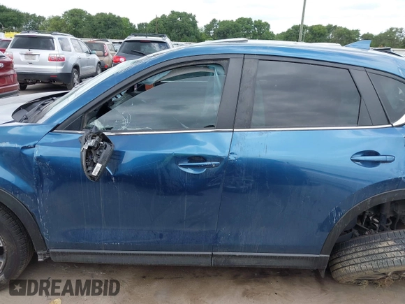 2018 Mazda CX-5 Touring z VIN JM3KFACM5J1442416, wystawiony jako IAAI lot #42093137 z przebiegiem 65 102 mil mil oraz . Historia ofert i sprzedaży dostępna na DreamBid. Obrazek 15.