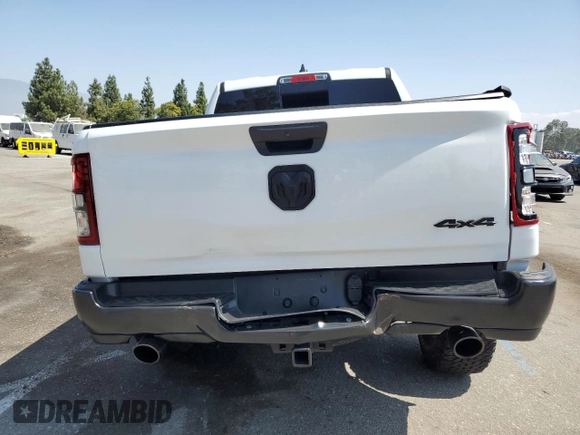 2023 Ram 1500 Tradesman with VIN 1C6SRFGT7PN684311, listed as a Copart auction lot 69792804 with 13,946 mi miles and Salvage title. Bid and sale history available at DreamBid. Image 6.
