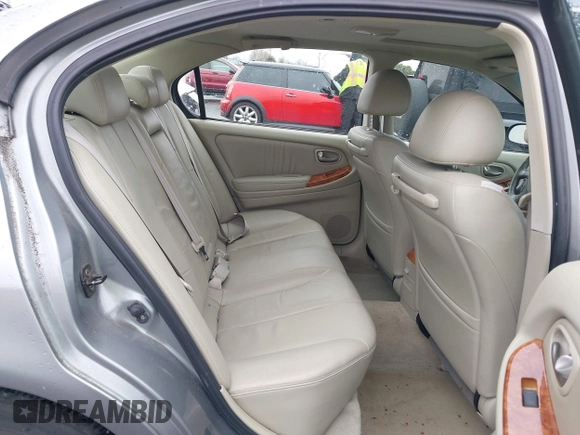 2004 Infiniti I35 with VIN JNKDA31A74T208001, listed as a IAAI auction lot 41835959 with 84,747 mi miles. Bid and sale history available at carsss.com. Image 8.