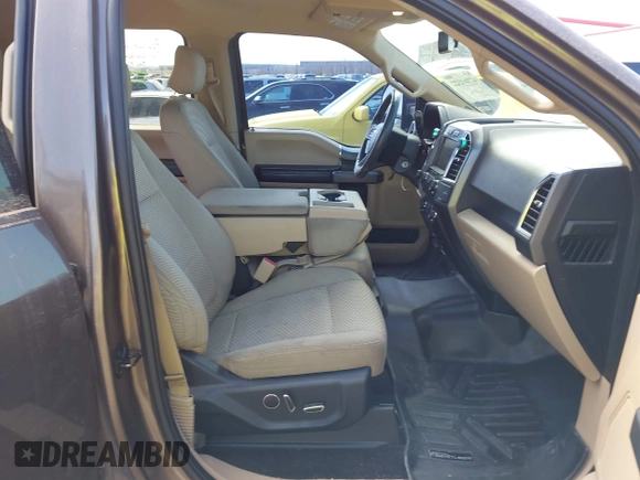 2015 Ford F-150 XLT with VIN 1FTEW1EG8FKE04306, listed as a IAAI auction lot 41864522 with 133,373 mi miles. Bid and sale history available at carsss.com. Image 5.