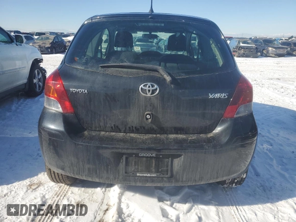 2011 Toyota Yaris with VIN JTDJT4K39B5336620, listed as a Copart auction lot 42252725 with 84,623 mi miles and Salvage Title. Bid and sale history available at carsss.com. Image 6.