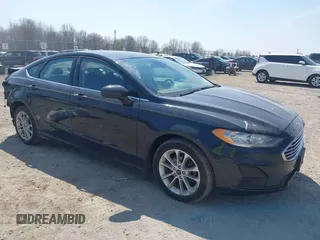 2020 Ford Fusion SE z VIN 3FA6P0LUXLR105191, wystawiony jako IAAI lot #42091487 z przebiegiem 80 392 mil mil oraz . Historia ofert i sprzedaży dostępna na DreamBid. Obrazek 1.