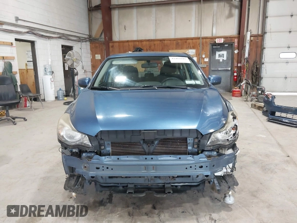 2015 Subaru Impreza Premium z VIN JF1GJAK60FH003323, wystawiony jako IAAI lot #42414105 z przebiegiem 107 185 mil mil oraz . Historia ofert i sprzedaży dostępna na DreamBid. Obrazek 13.