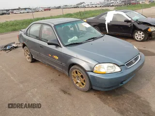 1997 Honda Civic DX z VIN 2HGEJ6525VH586800, wystawiony jako IAAI lot #42388090 z przebiegiem 255 879 mil mil oraz . Historia ofert i sprzedaży dostępna na DreamBid. Obrazek 1.