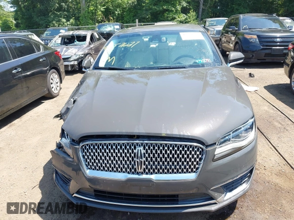 2017 Lincoln MKZ Hybrid Black Label with VIN 3LN6L5NU8HR639681, listed as a IAAI auction lot 42571227 with 123,522 mi miles and . Bid and sale history available at DreamBid. Image 12.