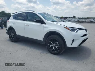 2018 Toyota RAV4 Hybrid SE with VIN JTMJJREVXJD212926, listed as a Copart auction lot 60215465 with 71,876 mi miles and Salvage title. Bid and sale history available at DreamBid. Image 4.