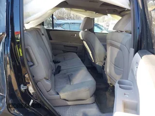 2015 Honda Pilot SE with VIN 5FNYF4H32FB064719, listed as a IAAI auction lot 41442845 with 122,631 mi miles and . Bid and sale history available at DreamBid. Image 8.