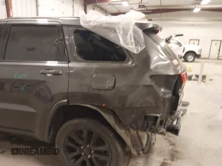 2018 Jeep Grand Cherokee Laredo E with VIN 1C4RJFAG6JC499261, listed as a IAAI auction lot 41033418 with 67,554 mi miles and . Bid and sale history available at DreamBid. Image 6.