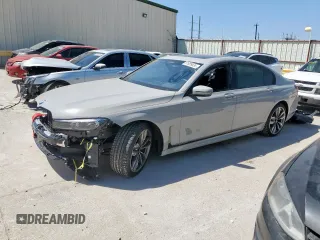 2022 BMW 7 Series with VIN WBA7U6C02NCJ06924, listed as a Copart auction lot 51989835 with 14,200 mi miles and Salvage title. Bid and sale history available at DreamBid. Image 1.