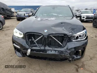2020 BMW X4 M40i z VIN 5UX2V5C01L9D35126, wystawiony jako Copart lot #87261374 z przebiegiem 56 904 mil mil oraz Czysty tytuł • Clean title. Historia ofert i sprzedaży dostępna na DreamBid. Obrazek 5.