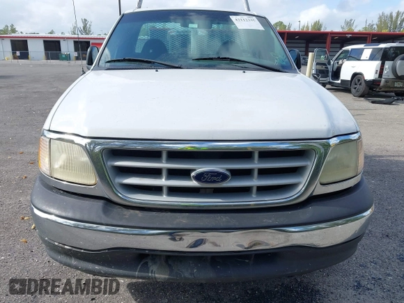 1999 Ford F-150 z VIN 1FTZF1729XKB56992, wystawiony jako IAAI lot #42112335 z przebiegiem 230 061 mil mil oraz . Historia ofert i sprzedaży dostępna na DreamBid. Obrazek 13.