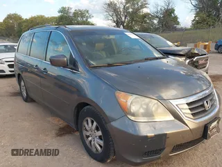 2010 Honda Odyssey EX-L with VIN 5FNRL3H70AB074913, listed as a IAAI auction lot 40142162 with 210,771 mi miles and . Bid and sale history available at DreamBid. Image 1.