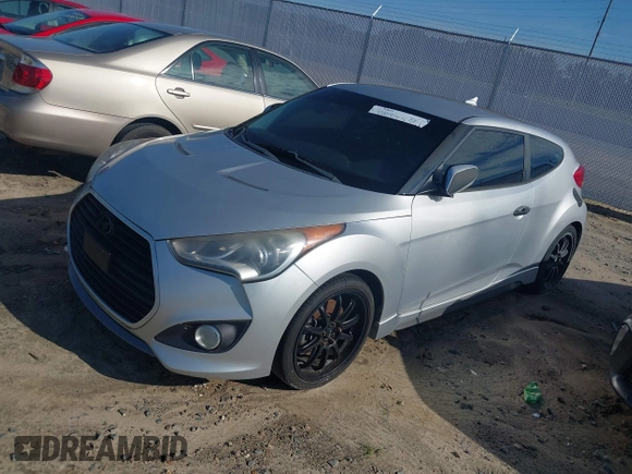 2013 Hyundai Veloster Turbo with VIN KMHTC6AE5DU112756, listed as a IAAI auction lot 42854505 with 99,015 mi miles and . Bid and sale history available at DreamBid. Image 2.