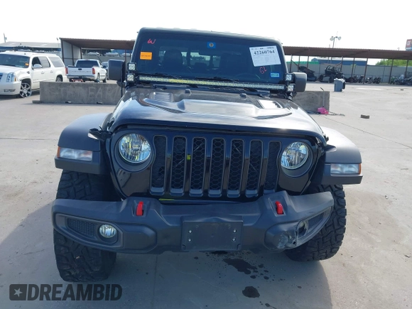 2021 Jeep Gladiator Rubicon z VIN 1C6JJTBG6ML535939, wystawiony jako IAAI lot #42260764 z przebiegiem 114 060 mil mil oraz . Historia ofert i sprzedaży dostępna na DreamBid. Obrazek 12.