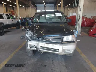2001 Isuzu Trooper S with VIN JACDJ58X917J09299, listed as a IAAI auction lot 41296724 with 131,829 mi miles and . Bid and sale history available at DreamBid. Image 12.