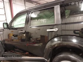 2007 Dodge Nitro SXT with VIN 1D8GU28K67W663621, listed as a IAAI auction lot 41691529 with 211,556 mi miles. Bid and sale history available at carsss.com. Image 15.