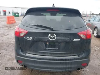 2014 Mazda CX-5 Grand Touring with VIN JM3KE4DY5E0373731, listed as a IAAI auction lot 41517852 with 148,414 mi miles. Bid and sale history available at carsss.com. Image 16.