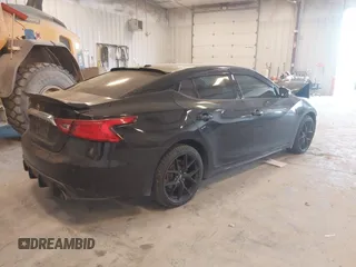 2016 Nissan Maxima SL z VIN 1N4AA6AP6GC393291, wystawiony jako IAAI lot #42104381 z przebiegiem 88 154 mil mil oraz . Historia ofert i sprzedaży dostępna na DreamBid. Obrazek 4.