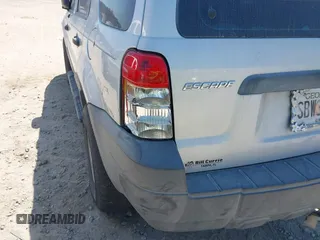 2005 Ford Escape XLS Value with VIN 1FMYU02Z35KD14123, listed as a IAAI auction lot 41989367 with 255,422 mi miles. Bid and sale history available at carsss.com. Image 12.