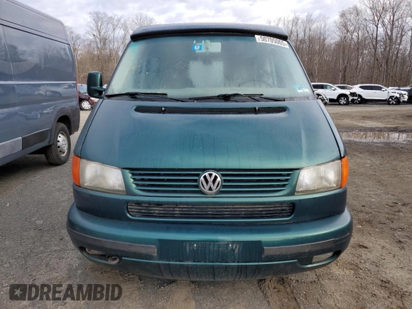 2002 Volkswagen EuroVan MV с VIN WV2NB47092H095600, выставлен на аукционе Copart как лот 50705065 с пробегом 223 049 миль миль и Чистый • Clean title. История ставок и продаж доступна на DreamBid. Изображение 5.