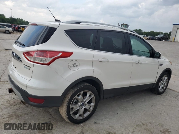 2014 Ford Escape Titanium с VIN 1FMCU0J97EUB15513, выставлен на аукционе Copart как лот 57391715 с пробегом 125 851 миль миль и Списание • Salvage title. История ставок и продаж доступна на DreamBid. Изображение 3.