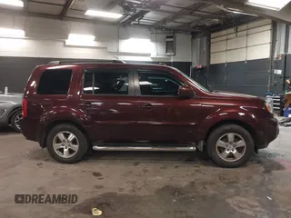 2009 Honda Pilot EX-L with VIN 5FNYF48569B021586, listed as a IAAI auction lot 41609721 with 291,598 mi miles. Bid and sale history available at carsss.com. Image 13.
