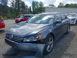 2014 Volkswagen Passat SEL Premium with VIN 1VWCS7A32EC026868, listed as a IAAI auction lot 42020450 with 90,993 mi miles. Bid and sale history available at carsss.com. Image 2.