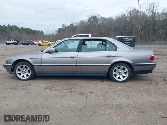 1998 BMW 7 Series 740il with VIN WBAGJ8323WDM23239, listed as a IAAI auction lot 41512630 with 221,673 mi miles. Bid and sale history available at carsss.com. Image 15.